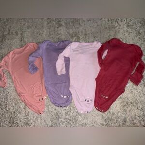 The Honest Company Kids Bodysuits in Pink, Purple, and Red